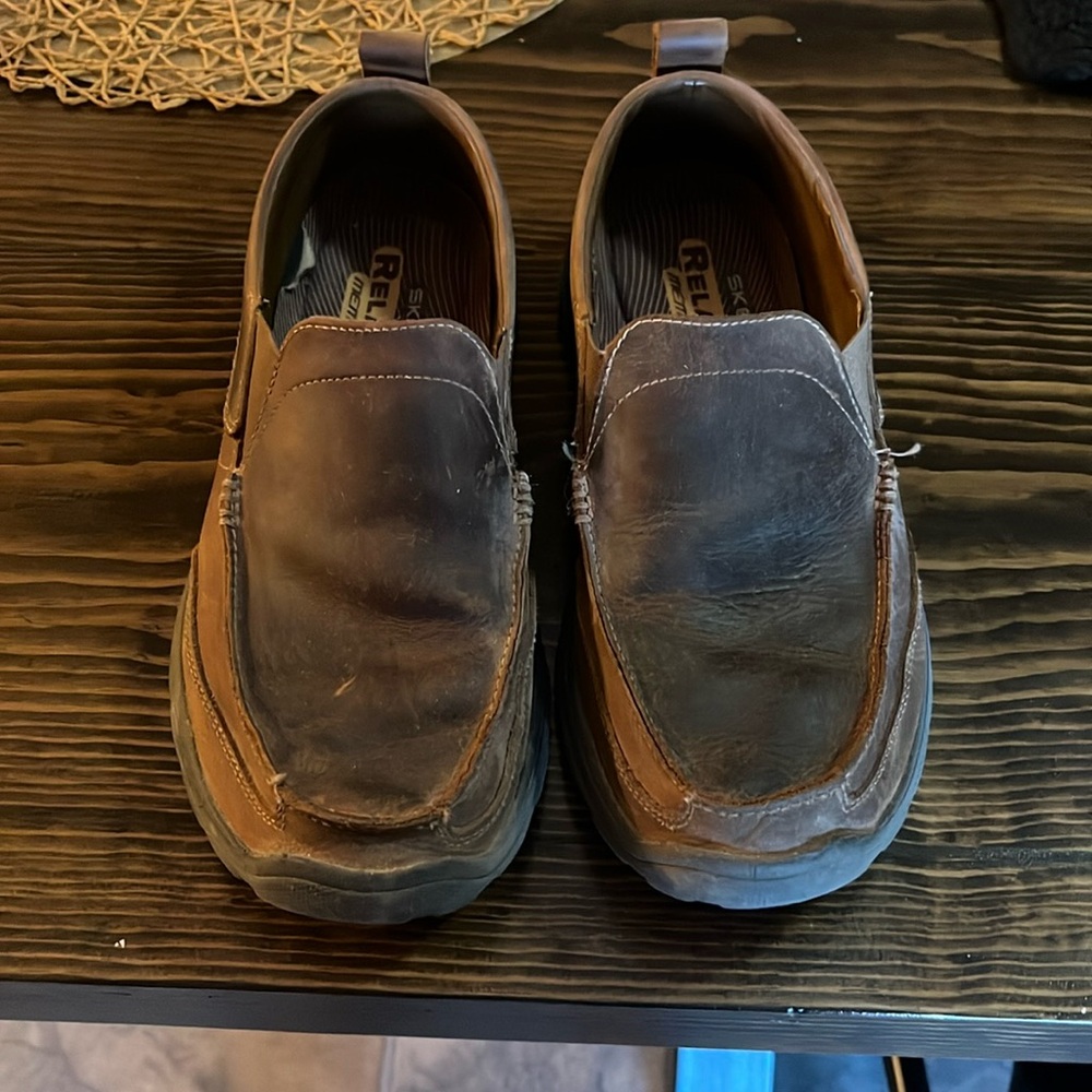 Men’s Skechers relaxed fit memory foam leather loafers.